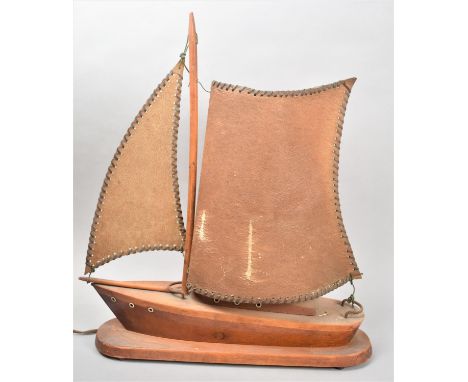 An Early/Mid 20th Century Novelty Table Lamp in the form of a Sailing Boat, 38cm Long 