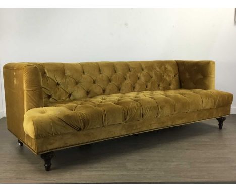 BUTTON BACK SOFA, 20TH CENTURY  upholstered in mustard velour on turned and tapered supportsapprox 190cm longIn overall good 