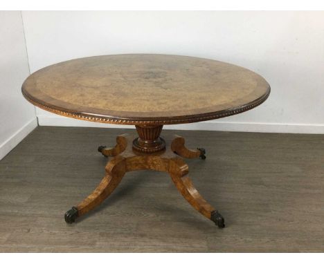 WALNUT AND BURR WALNUT CIRCULAR BREAKFAST TABLE, EARLY 19TH CENTURY the cross-banded top with moulded rim, raised on tapered 