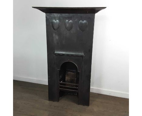 C.F.A. VOYSEY (BRITISH, 1857–1941) FOR THE FALKIRK IRON COMPANY, MODEL 64 CAST IRON FIREPLACE, DESIGNED 1899 with overhanging