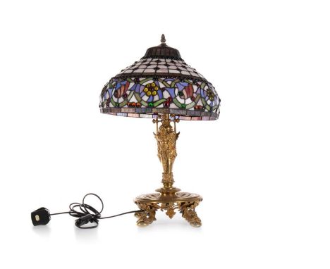 ART NOUVEAU TABLE LAMP,  IN THE STYLE OF TIFFANY, 20TH CENTURY with simulated stained and leaded glass domed shade decorated 