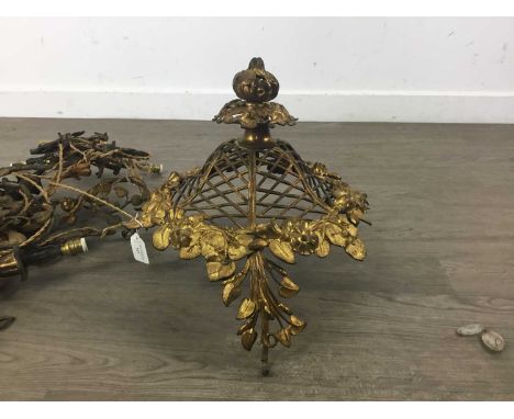 GILDED CAST METAL CHANDELIER, EARLY 20TH CENTURY  decorated with trailing branches and leaves within lattice sectionsThere ar