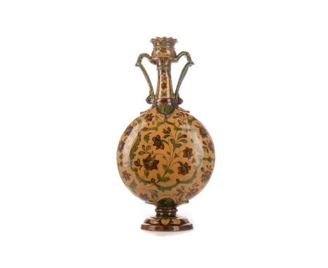 MAJOLICA MOON FLASK,  19TH CENTURY possibly Spanish/Moroccan, with twin handles, painted in green and brown tones35.5cm highI