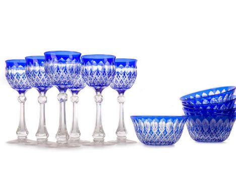 SET OF SIX BOHEMIAN BLUE FLASHED HOCK GLASSES AND SIX BOWLS, EARLY 20TH CENTURY  with cut and faceted detail, the glasses on 