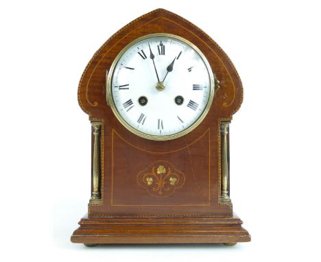 Art Nouveau mahogany inlaid mantle clock with brass columns, height 27cm