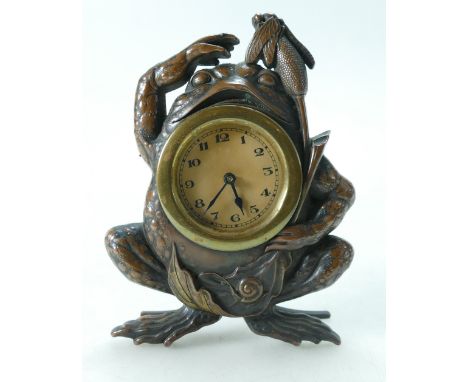 Clock in hard metal novelty frog design case, 15.5cm high.