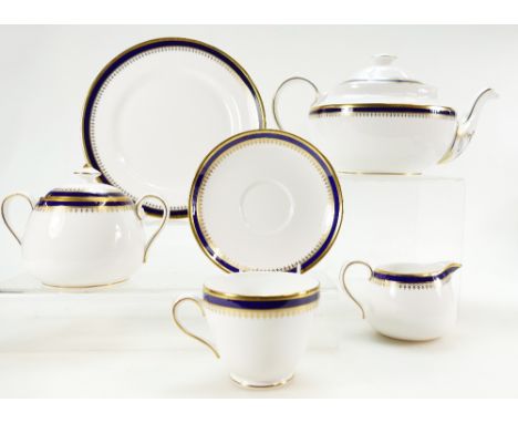 A large collection of Spode dinnerware in the Knightsbridge design. (4 trays, 65 items)
