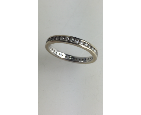 18ct white gold diamond eternity ring with combined half carat of diamonds, size K, 2.5 grams