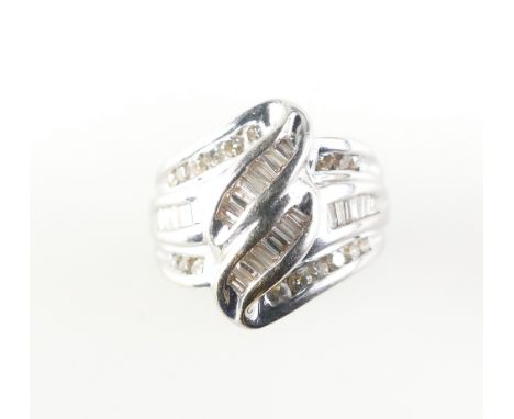 18ct White gold ladies dress ring set with 21 baguette and 18 round diamonds, size L/M, 8.9 grams