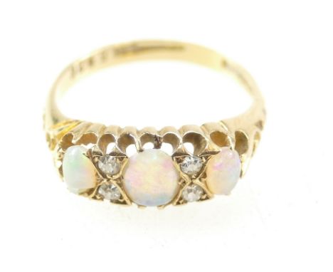 18ct gold Ladies three stone opal and diamond ring size N, 3.7 grams.