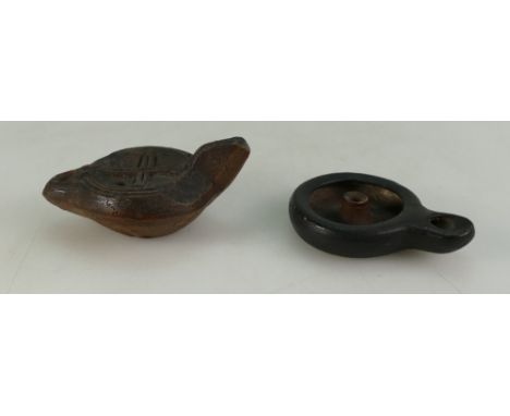 Two small ancient clay lamps, believed to be of Greek or Roman origin.  One, in very good condition, bearing an old museum ty