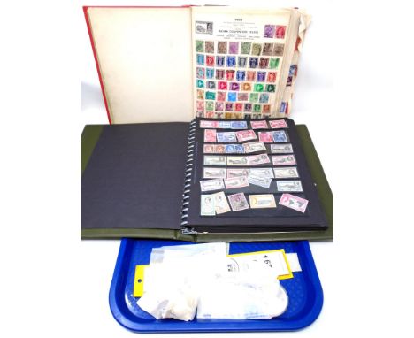 Two stamp albums containing antique and later world stamps, first day covers together with a Montreal 1976 Olympiad 10 Dollar