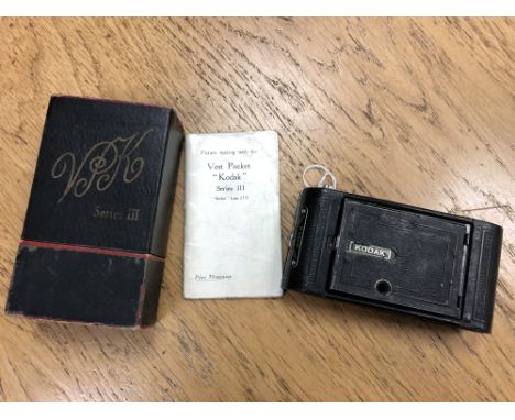 A Kodak Series III vest pocket folding camera with original instructions
