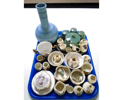A tray containing assorted ceramics including commemorative china, Goss crested pieces, Denby cruet set, pottery vase etc.