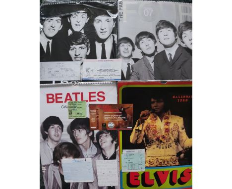 A collection of Beatles and Elvis Presley calendars, and vintage concert tickets from Frank Zappa, Robbie Williams, Cliff Ric