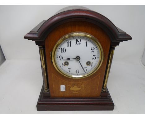 A late 19th century Junghans inlaid mahogany bracket clock with enamelled dial.