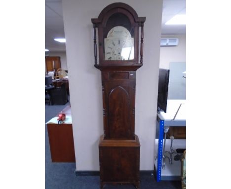 A 19th century mahogany longcase clock case with painted dial signed Thos S Howlette, Coventry (lacking movement) 