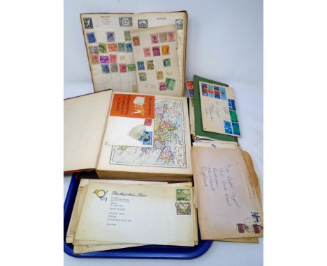 Two albums containing early 20th century and later world stamps, first day covers and envelopes bearing stamps.