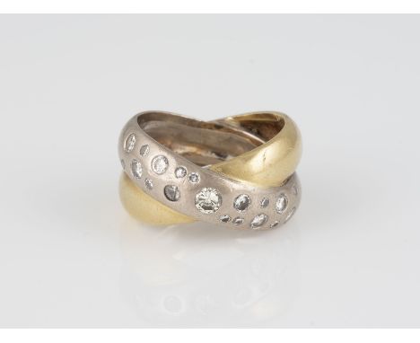 BRILLANT-RING Gelbgold, Weißgold. Ringmaß ca. 54,5, Ges.-Gew. ca. 12,8 g. Gest. 18 K, wohl Herstellersignet. 18 Brillanten, z