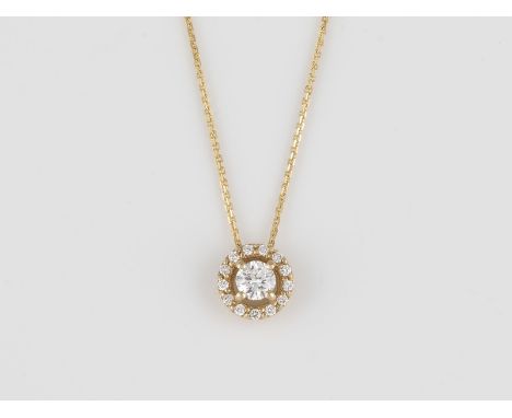 ANHÄNGER MIT KETTE Gelbgold. Anhänger D. 0,8 cm, Kette L. 45 cm. Ges.-Gew. ca. 1,6 g. Gest. 14 K, 585. 14 Brillanten, zusamme
