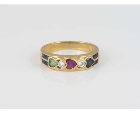 EDELSTEIN-RING Gelbgold. Ringmaß ca. 53, Ges.-Gew. ca. 4,1 g. Gest. 18 K. Saphire, ein Rubin, ein Smaragd, zwei Brillanten, z