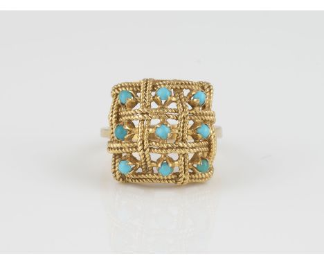 TÜRKIS-RING Gelbgold. Ringmaß ca. 54, Ges.-Gew. ca. 6,1 g. Gest. 750, Herstellerzeichen 'CB'. Neun halbierte Türkis-Perlen.