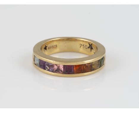 MULTICOLOR-RING Gelbgold. Ringmaß ca. 53, Ges.-Gew. ca. 6,7 g. Gest. 750. Neun rechteckig facettierte Farbsteine, u.a. Amethy