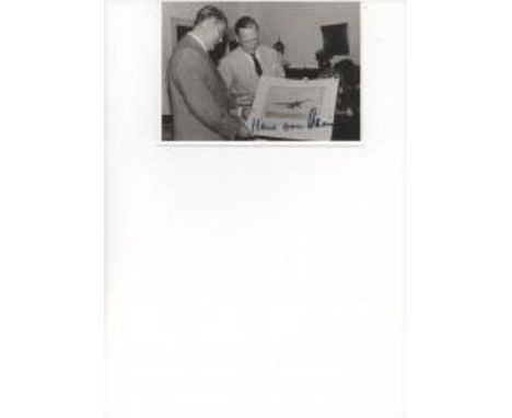  German inventor of the Jet Engine Hans von Ohain Signed 15 x 10 cm photograph.  He is in the centre and is in discussion wit