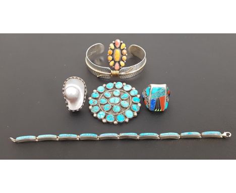 SELECTION OF NATIVE AMERICAN AND OTHER SILVER JEWELLERYthe Native American pieces including an orange stone set ring marked '