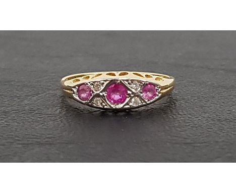 RUBY AND DIAMOND RINGthe three graduated rubies separated by small diamonds, on eighteen carat gold shank, ring size O 