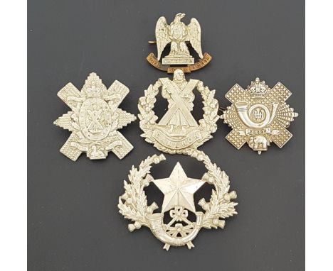 SELECTION OF FIVE METAL MILITARY CAP BADGESincluding the Royal Scots Greys, Cameron Highlanders, Black Watch, Highland Light 