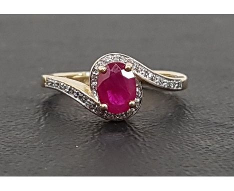 RUBY AND DIAMOND RINGthe central oval cut ruby approximately 0.8cts in diamond set surround and twist setting, on nine carat 