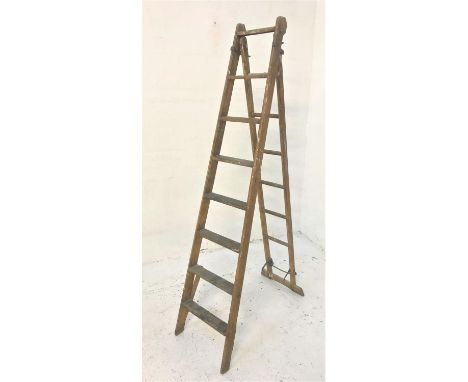VINTAGE WOODEN EXTENDING STEP LADDERmarked 'The Patent Safety Ladder Company Patent', 210cm not extended 