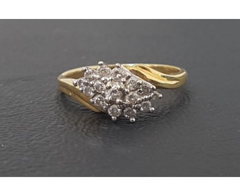 DIAMOND CLUSTER RINGon eighteen carat gold shank with twist setting, the diamonds totaling approximately 0.3cts, ring size M 