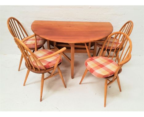 ERCOL TEAK GATE LEG TABLEwith shaped drop flaps, 128cm wide, together with four stick back beech and elm chairs, on turned su