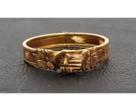 UNMARKED GOLD HINGED GIMMEL FEDE RINGwith clasped hand detail opening to reveal two hearts, and engraved decoration, ring siz