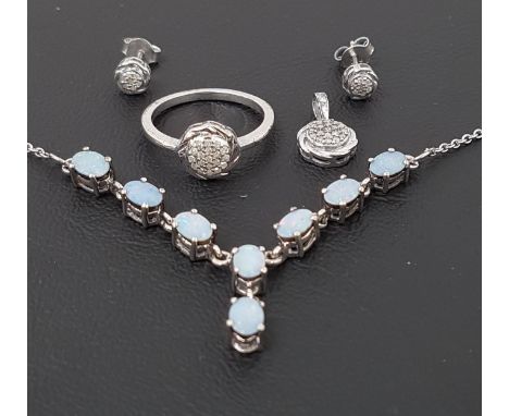 SELECTION OF SILVER JEWELLERYcomprising a suite of diamond set jewellery - ring, pendant and a pair of stud earrings; togethe