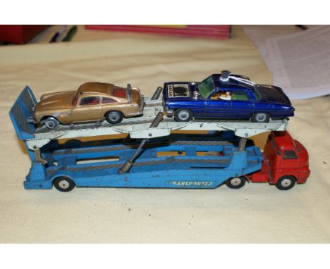 Corgi toys Diecast models, James Bonds Aston Martin DB5, Man from U.N.C.L.E. Oldsmobile and a car transporter.