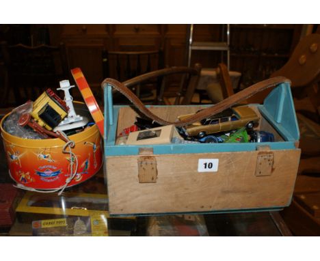 Old wooden box containing Diecast vehicles including Batmans Batmobile, The Man form U.N.C.L.E. Oldsmobile, a Massey Ferguson