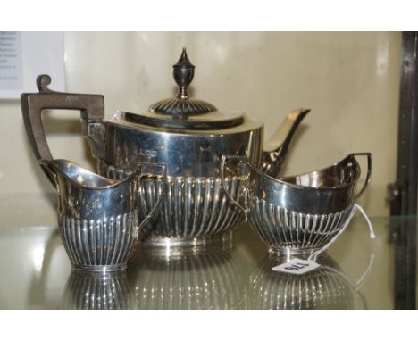 Three-piece silver tea service with fluted body London 1907 gross weight 22.29 oz