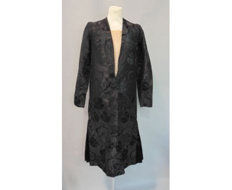 1920's/30's dress in black silk with jacquard weave;  jacket style front has enclosed front panel in peach silk with lace and