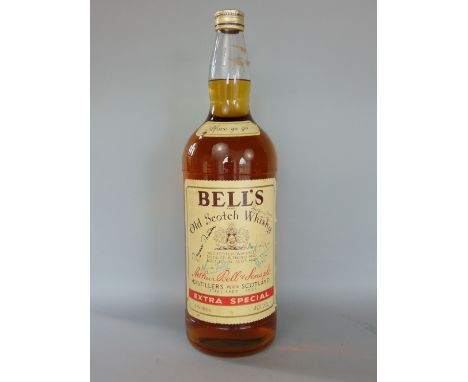 4.5 litre bottle of Bell's Old Scotch Whiskey, inscribed with the signatures of Margaret Thatcher, Norman Tebitt, Douglas Hur