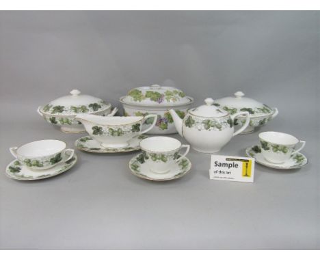 A collection of Royal Worcester  Hop Mathon pattern dinner and teawares including three tureens and covers, two sauce boats a