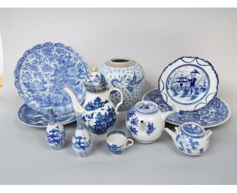 A collection of 19th century and later oriental  blue and white ceramics including a ginger jar with dragon and exotic bird d