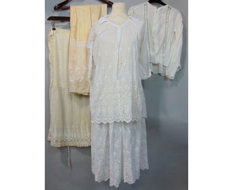 Box of good quality antique textiles including two full length embroidered silk waist petticoats, a blouse with hand made lac