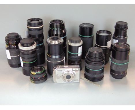 A box containing a large quantity of camera lenses (14)