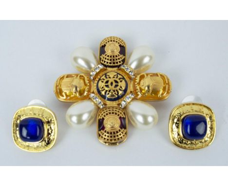 CHANEL BROOCH, gilt metal faux pearl and enamel, with beetle applied mounts on yellow enamels and further gilt mounts on red 