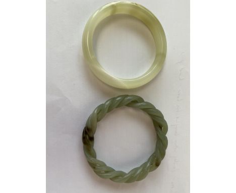 Beautifully carved natural Jade bracelet hollowed out three layer bangle, 8cm diam, and a finely carved natural jade bangle (