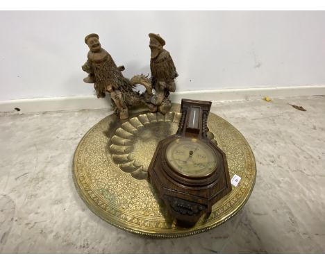 Islamic beaten copper table top tray, a modern barometer, straw work style sculpture of two ethnic gentleman 