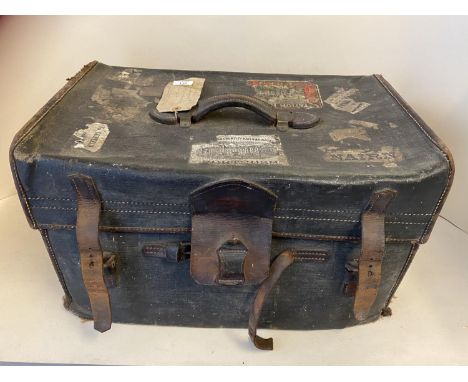 A vintage leather trunk, containing old newspapers from the 1800s. Condition all very worn 